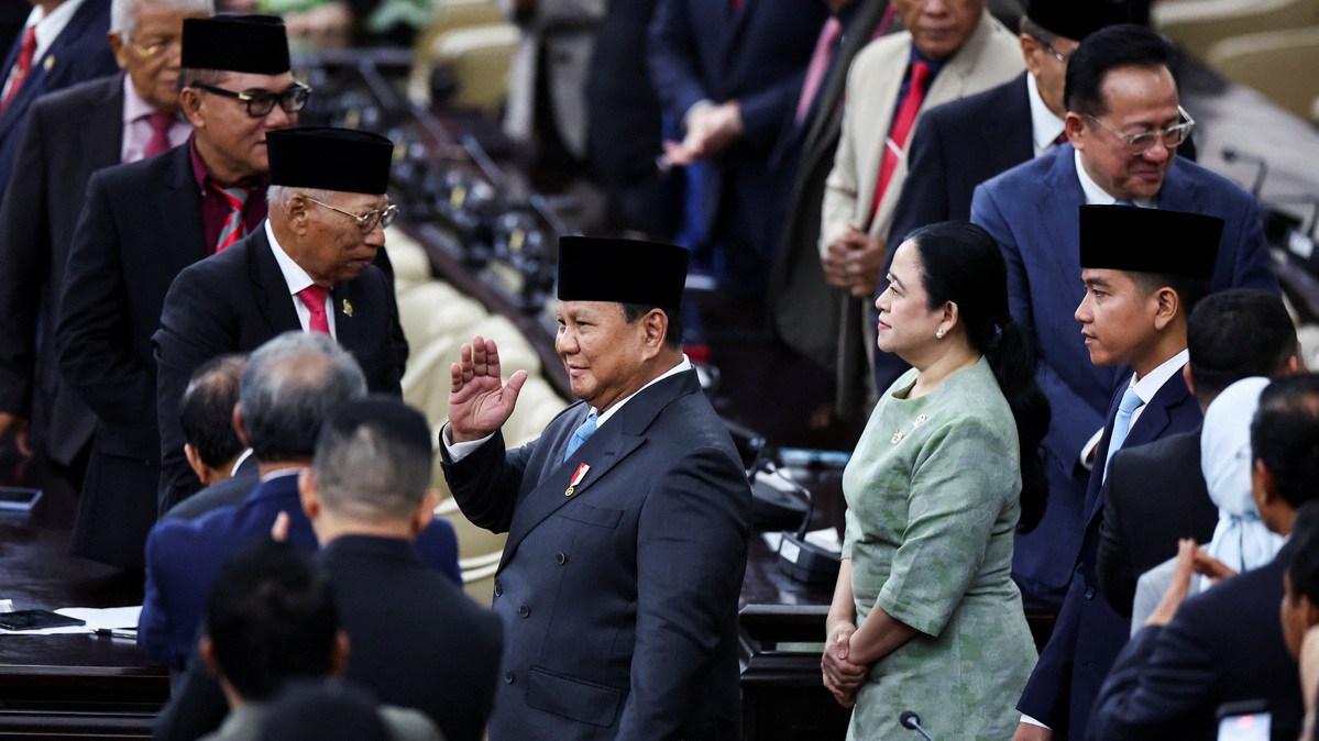 Indonesian President Prabowo Subianto gestures as he walks at the parliament building to deliver his speech on economic policies and the 2027 fiscal plan in Jakarta, Indonesia, May 20, 2026. REUTERS/Willy Kurniawan
