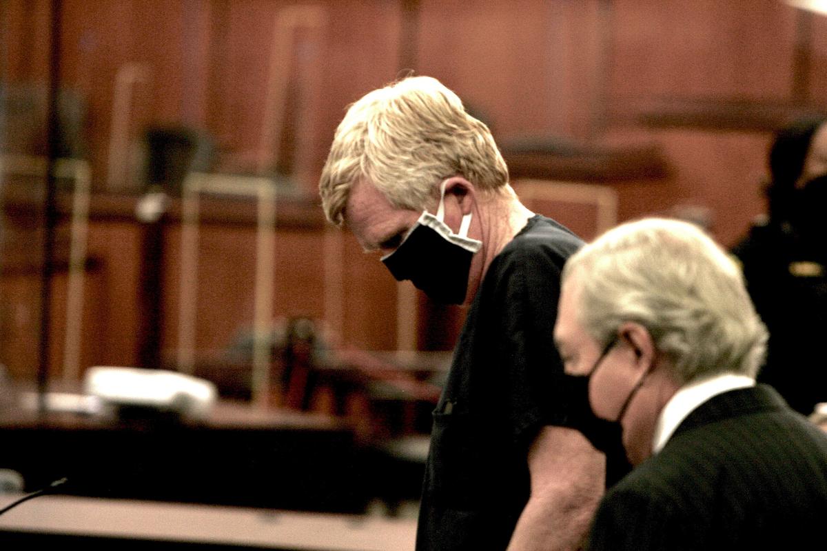 FILE - Alex Murdaugh awaits the beginning of his bond hearing in the Richland Judicial Center in Columbia, S.C., Tuesday, Oct. 19, 2021. Prosecutors say Murdaugh stole more than $8 million from former clients, including his dead housekeeper, an injured state trooper and other people as well as fees meant for his law firm. (AP Photo/Lewis M. Levine, Pool)