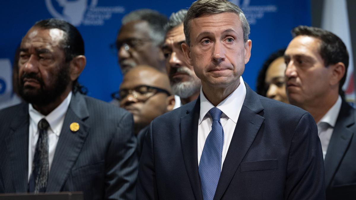 Ken Martin, chairman of the Democratic National Committee, listens to speakers during a news conference with Texas Democrats at the International Union of Painters and Allied Trades union hall on Aug. 5, 2025, in Aurora, Illinois. 