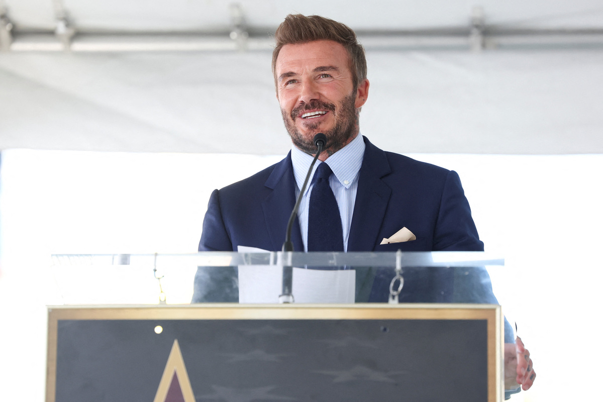 David Beckham speaks during his star unveiling ceremony on the Hollywood Walk of Fame, in Los Angeles, California, U.S., June 12, 2026. REUTERS/Mario Anzuoni