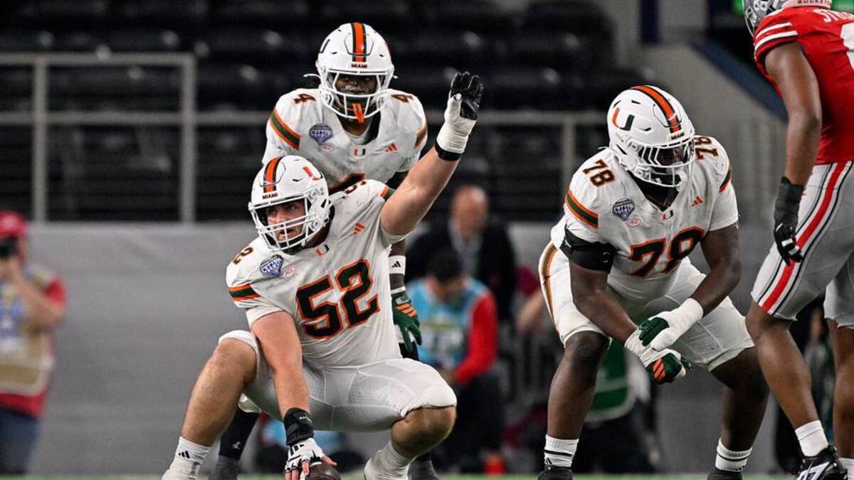  Dec 31, 2025; Arlington, TX, USA; Miami Hurricanes offensive lineman James Brockermeyer (52) and offensive lineman Matthew McCoy (78) get into position during the 2025 Cotton Bowl and quarterfinal game of the College Football Playoff at AT&T Stadium. Mandatory Credit: Jerome Miron-Imagn Images | IMAGN IMAGES via Reuters Connect 