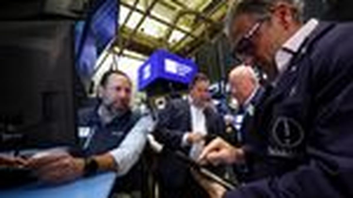 Traders work on the floor at the New York Stock Exchange (NYSE) in New York City, U.S., April 29, 2026.  REUTERS/Brendan McDermid