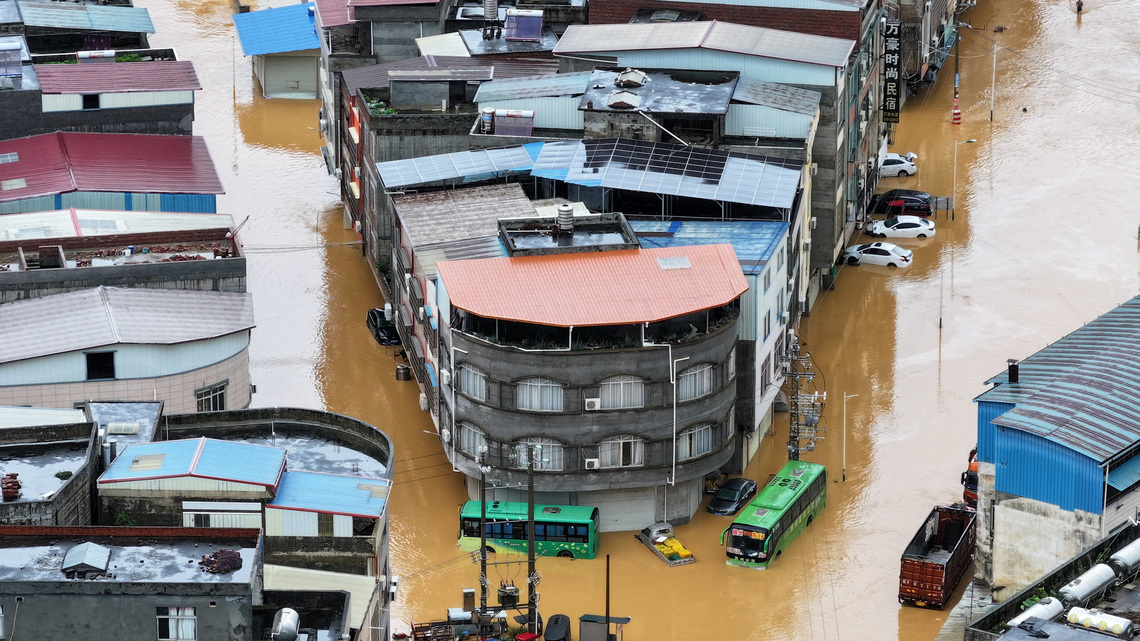 Flooding kills two in China's Nanning as east braces for super typhoon 