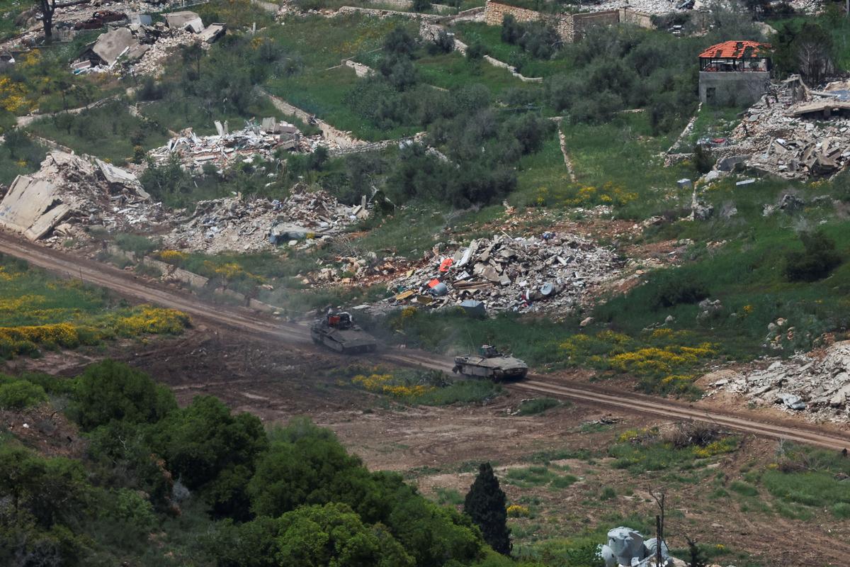 Israeli military vehicles leave Lebanon, as seen from the Israeli side of the Israel-Lebanon border, in northern Israel, May 6, 2026. REUTERS/Ammar Awad