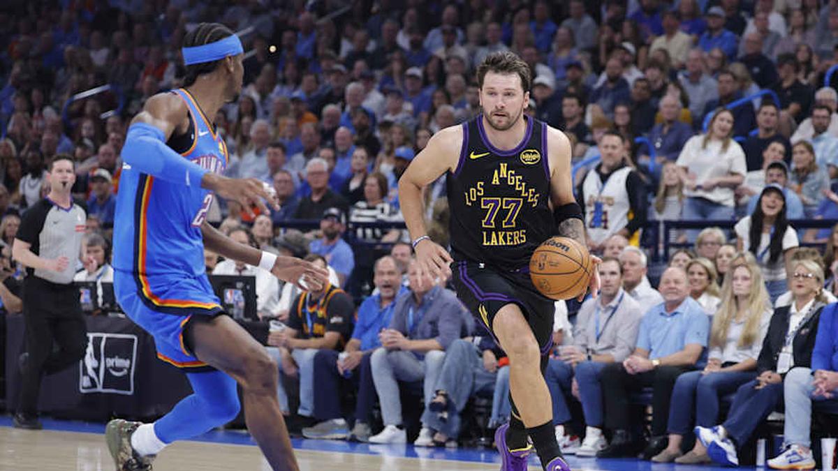  Lakers guard Luka Dončić drives to the basket against Thunder guard Shai Gilgeous-Alexander during their April 2 regular-season game. | Alonzo Adams-Imagn Images 