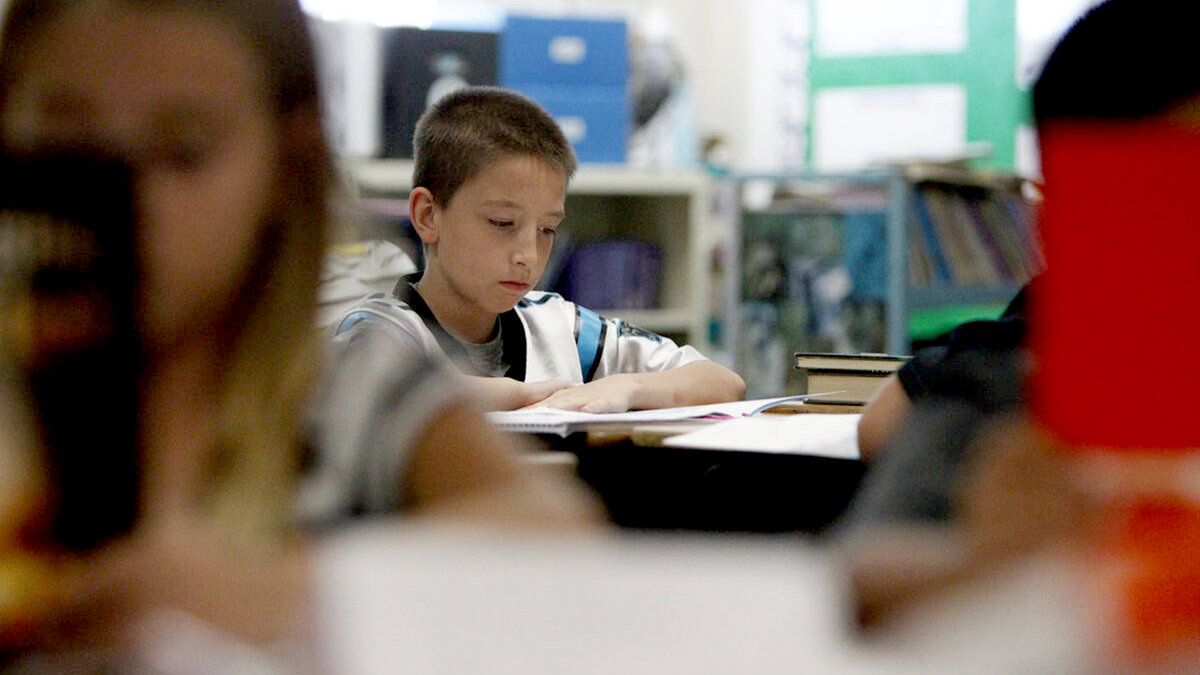 Fifth grader Connor Schwabel, 10, reads a books inside his classroom at Wright Elementary School in Las Vegas Friday, Sept. 19, 2014. An official student count today at schools across the state will determine the amount of money schools will receive for their students. (Erik Verduzco/Las Vegas Review-Journal/TNS)