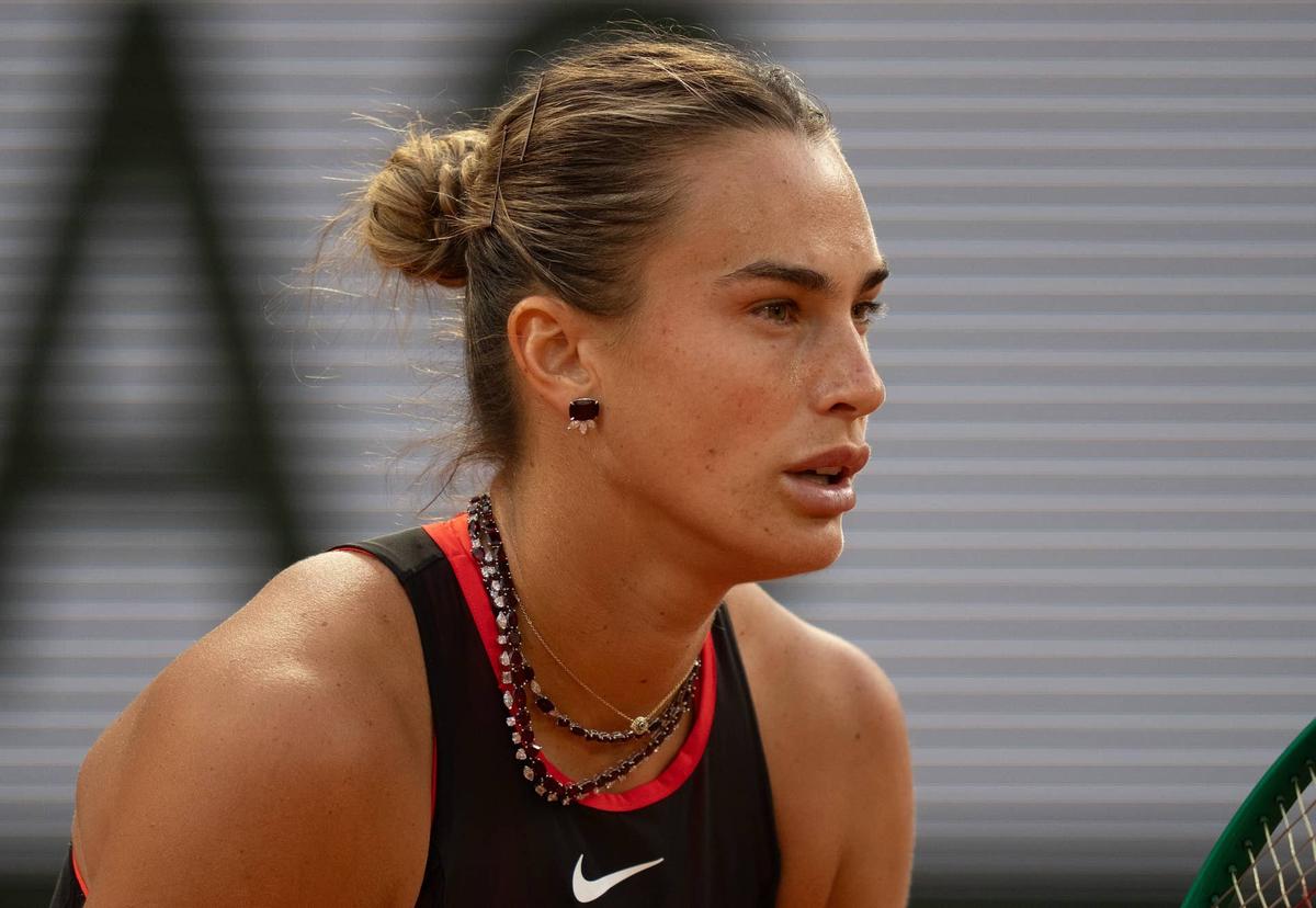  Jun 1, 2026; Paris, France; Aryna Sabalenka wearing her custom 24K diamond necklace during her match against Naomi Osaka of Japan on day nine at Stade Roland Garros. Mandatory Credit: Susan Mullane-Imagn Images 
