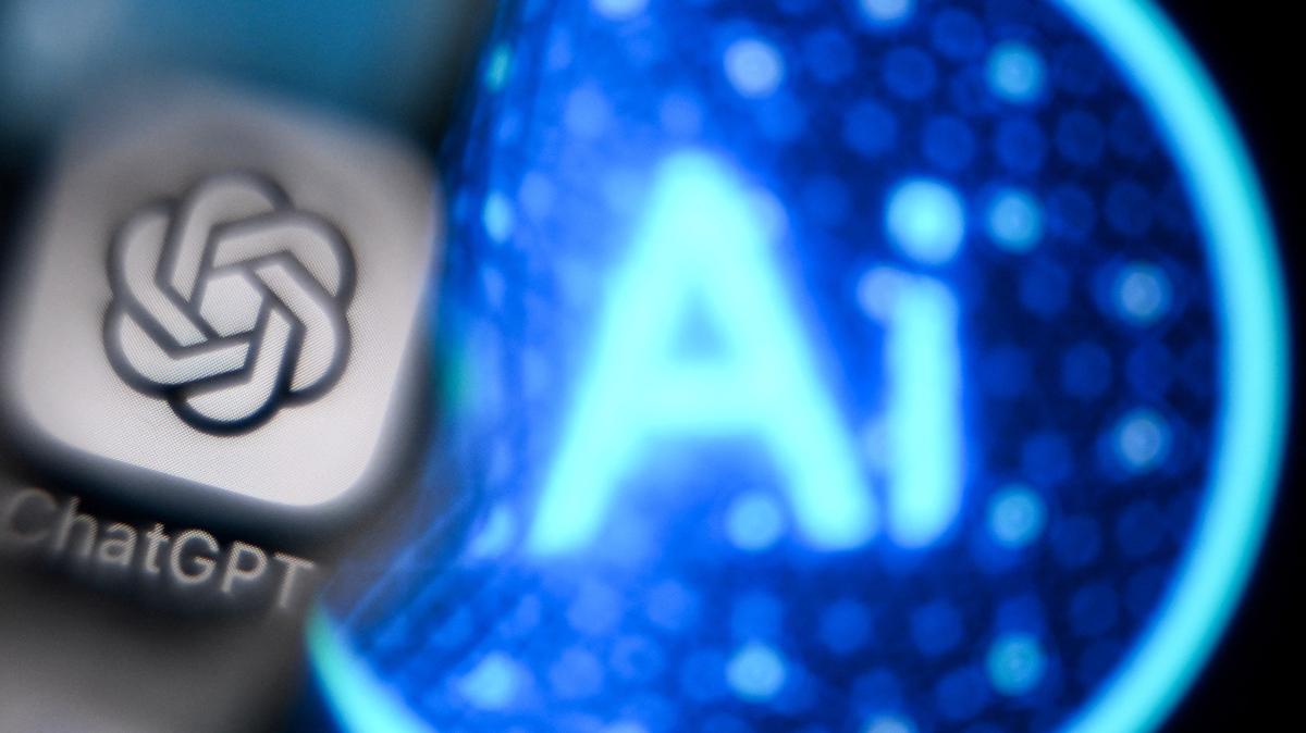 A photo taken on Nov. 27, 2024, shows the logo of the ChatGPT application developed by US artificial intelligence research organization OpenAI on a smartphone screen (L) and the letters AI on a laptop screen in Frankfurt am Main, western Germany. (Kirill Kudryavtsev/AFP/Getty Images/TNS)