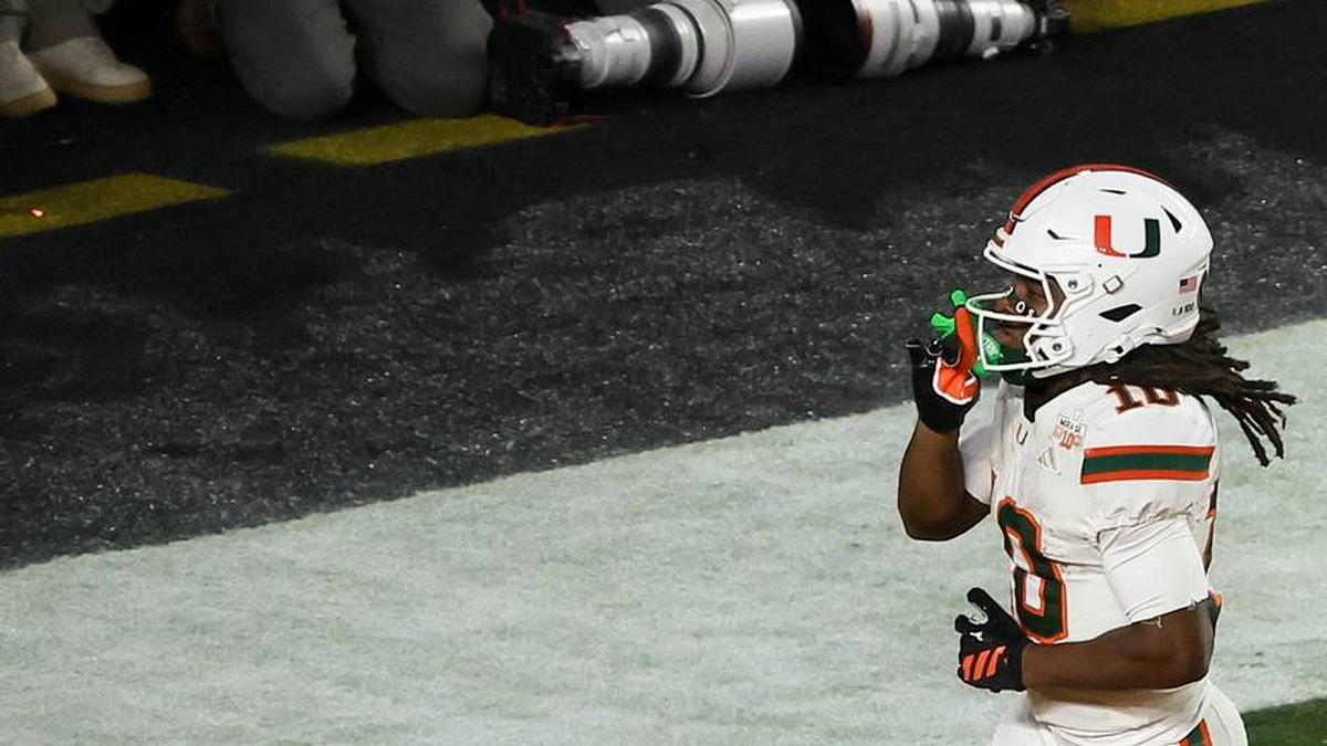  Jan 19, 2026; Miami Gardens, FL, USA; Miami Hurricanes wide receiver Malachi Toney (10) celebrates after scoring a touchdown against the Indiana Hoosiers in the fourth quarter during the College Football Playoff National Championship game at Hard Rock Stadium. Mandatory Credit: Kim Klement Neitzel-Imagn Images | Kim Klement Neitzel-Imagn Images 