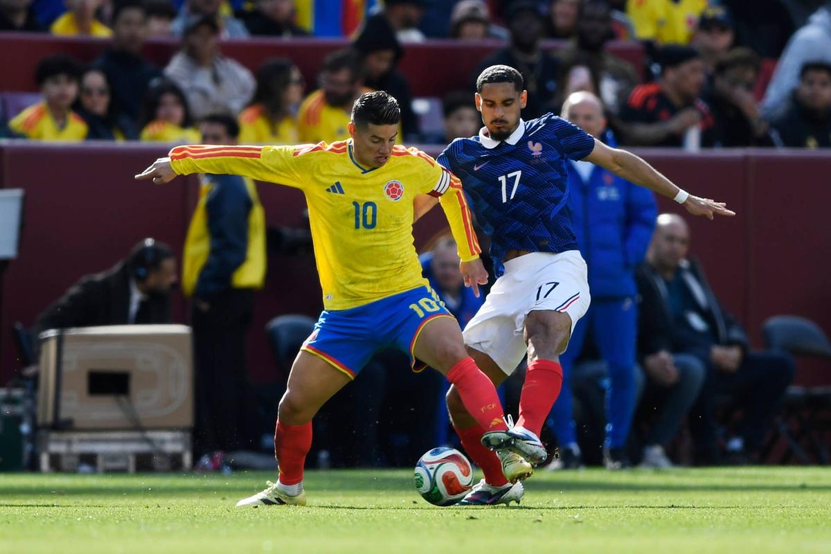  James Rodríguez of Colombia is challenged by Maxence Lacroix of France during the international friendly match between Colombia and France at Northwest Stadium on March 29, 2026 in Landover, Maryland. (Photo by Hannah Foslien/Getty Images) Photo by Hannah Foslien/Getty Images