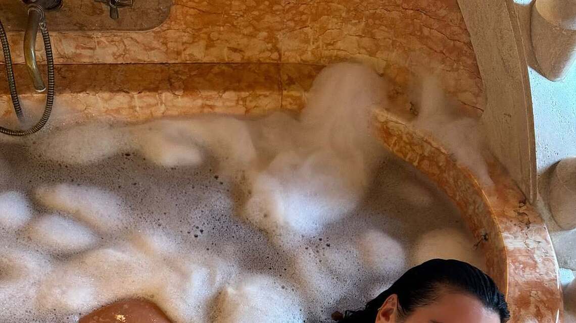 Dua Lipa Poses Naked in a Bath During Honeymoon With Husband Callum Turner 