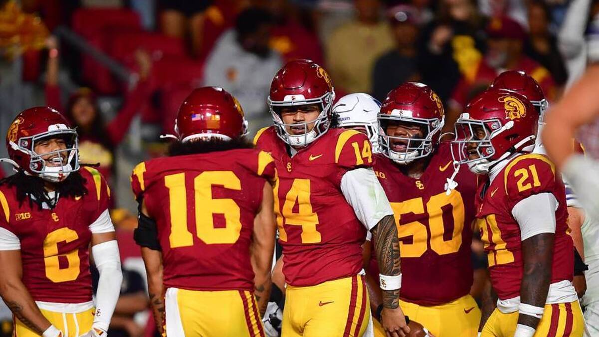  Nov 7, 2025; Los Angeles, California, USA; Southern California Trojans quarterback Jayden Maiava (14) celebrates his touchdown scored against the Northwestern Wildcats during the first half at the Los Angeles Memorial Coliseum. Mandatory Credit: Gary A. Vasquez-Imagn Images | IMAGN IMAGES via Reuters Connect 