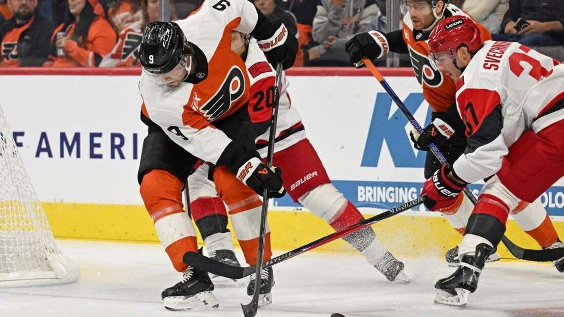 Canes rally past Flyers in OT to secure first win of title defense