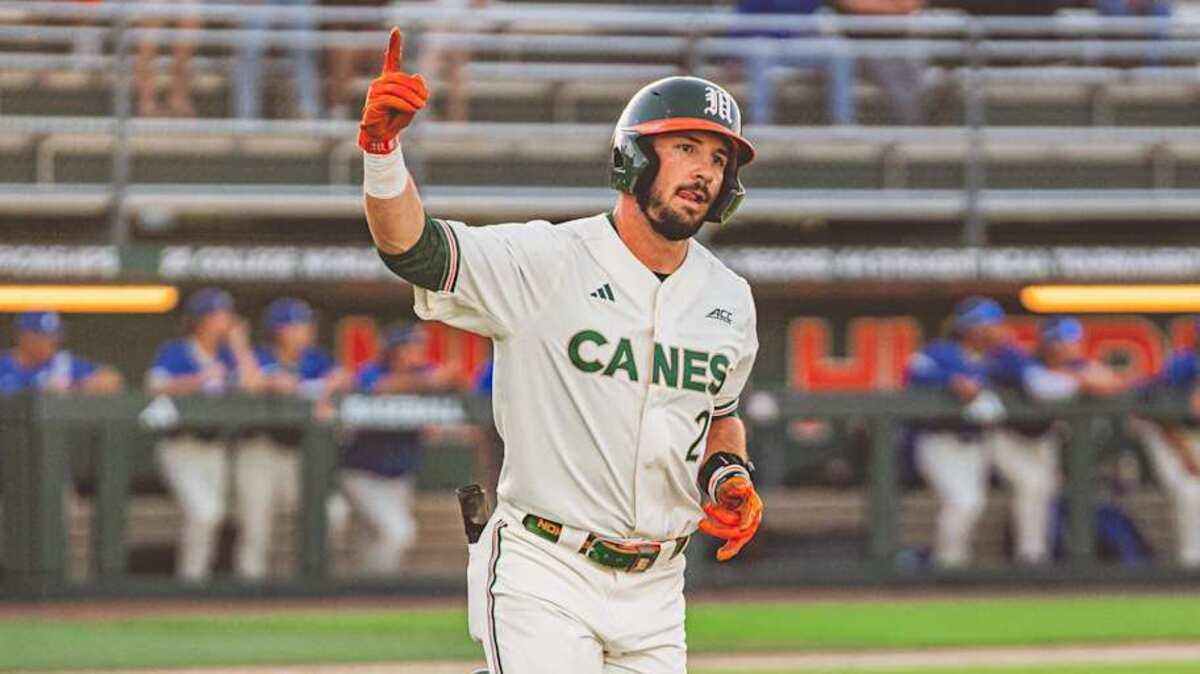 Miami right fielder Derek Williams Against Florida Gulf Coast and hitting a home run.