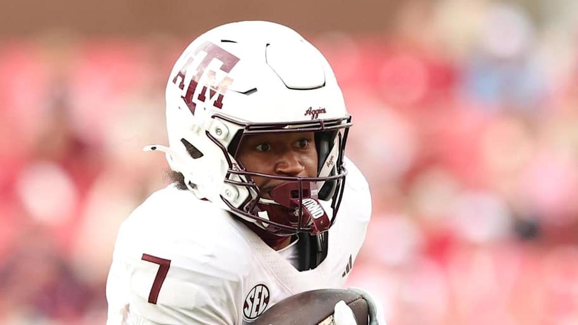  Oct 18, 2025; Fayetteville, Arkansas, USA; Texas A&M Aggies wide receiver KC Concepcion (7) runs after a catch during the first quarter against the Arkansas Razorbacks at Donald W. Reynolds Razorback Stadium. Mandatory Credit: Nelson Chenault-Imagn Images | Nelson Chenault-Imagn Images 