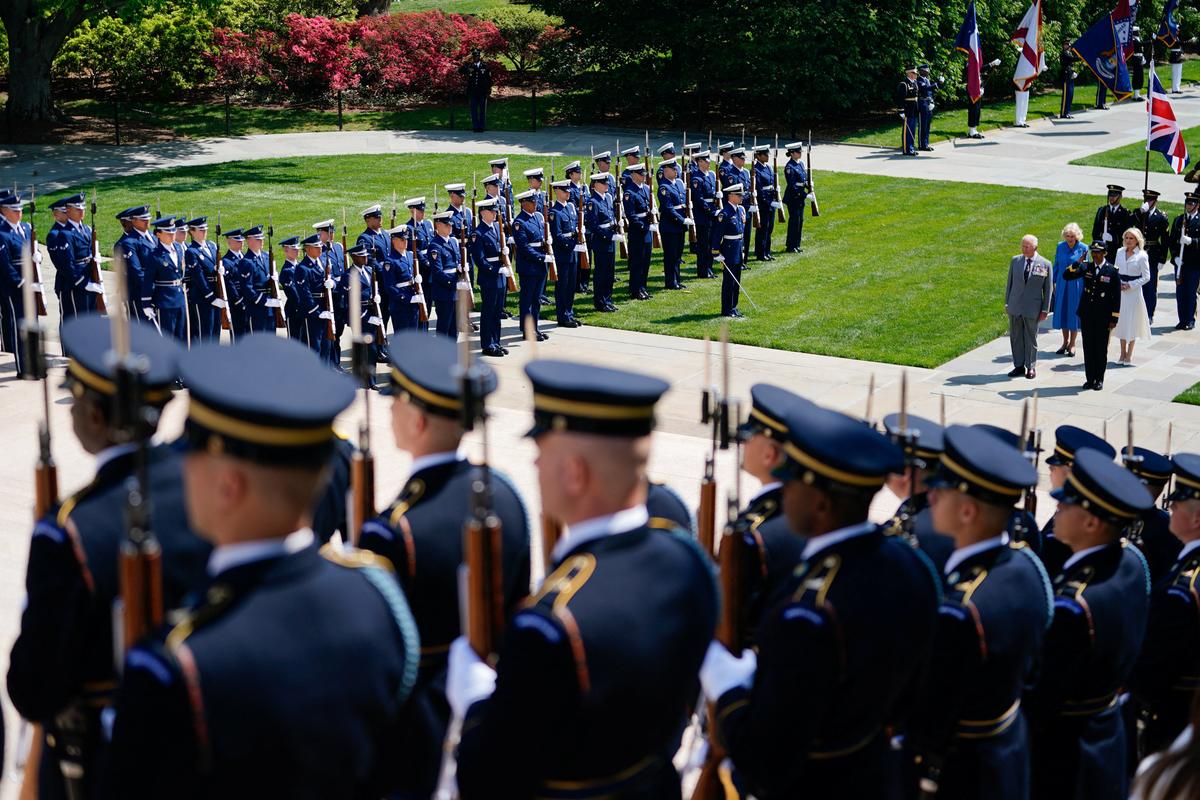 Britain's King Charles and Queen Camilla take part in a wreath-laying ceremony at the Tomb of the Unknown Soldier in Arlington National Cemetery, in Arlington, Virginia, U.S., April 30, 2026. REUTERS/Nathan Howard