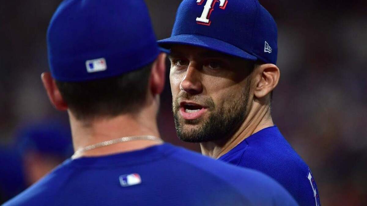 MLB: Texas Rangers at Boston Red Sox. Jun 14, 2026; Boston, Massachusetts, USA;  Texas Rangers pitcher Nathan Eovaldi (17) talks to his teammate during the eighth inning against the Boston Red Sox at Fenway Park. Mandatory Credit: Bob DeChiara-Imagn Images