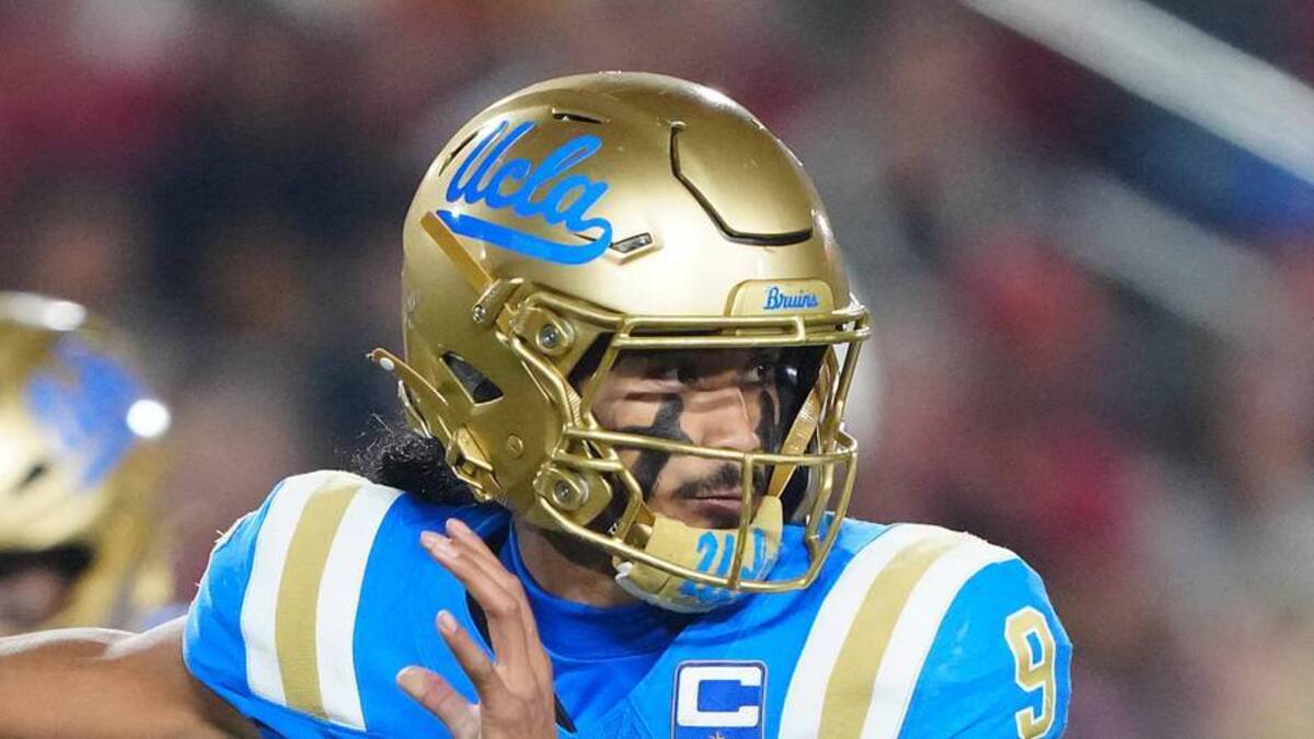  Nov 29, 2025; Los Angeles, California, USA; UCLA Bruins quarterback Nico Iamaleava (9) throws the ball against the Southern California Trojans in the first half at United Airlines Field at Los Angeles Memorial Coliseum. Mandatory Credit: Kirby Lee-Imagn Images | Kirby Lee-Imagn Images 