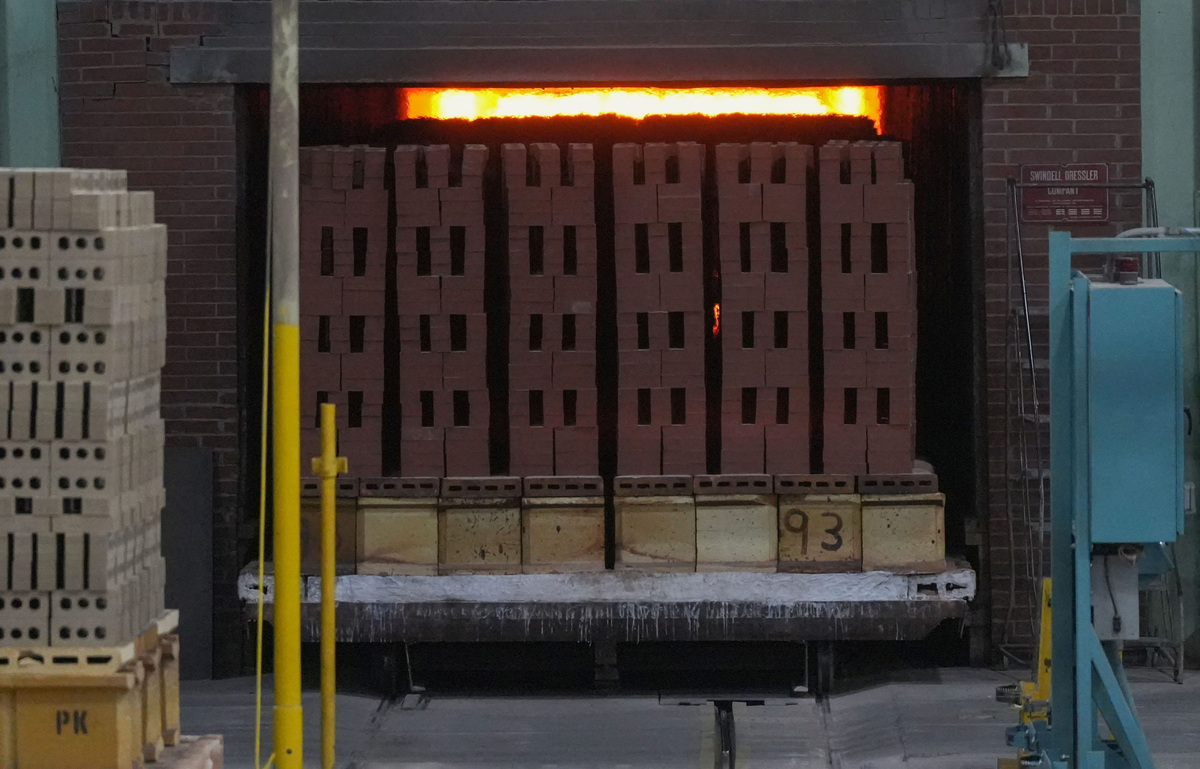 Fired bricks head out of the 400-foot-long tunnel kiln at Belden Brick in Sugarcreek, Ohio, U.S., November 12, 2025.  Kevin Whitlock/Massillon Independent/USA TODAY NETWORK via Imagn Images via REUTERS