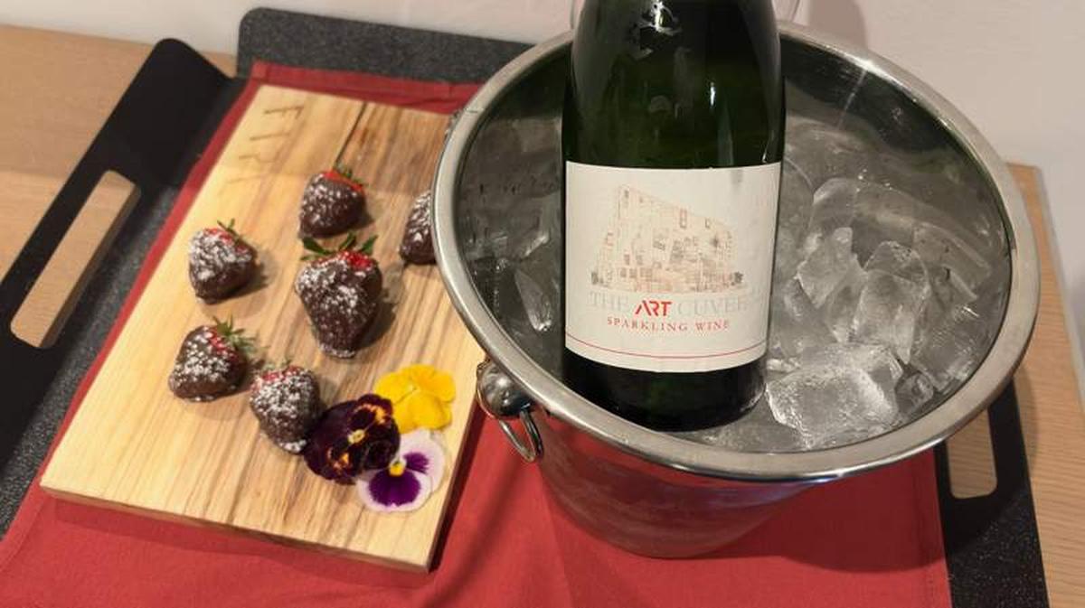  The Art Hotel welcomed me with chocolate-covered strawberries and a bottle of their own labeled sparkling white wine. Photo credit: Marcia Frost 
