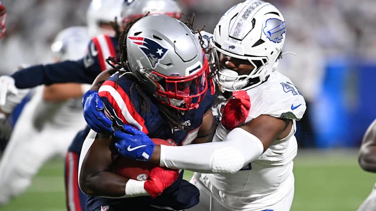  Oct 5, 2025; Orchard Park, New York, USA; New England Patriots running back Rhamondre Stevenson (38) is tackled by Buffalo Bills fullback Reggie Gilliam (41) on a kick off return during the second half at Highmark Stadium. Mandatory Credit: Mark Konezny-Imagn Images | Mark Konezny-Imagn Images 