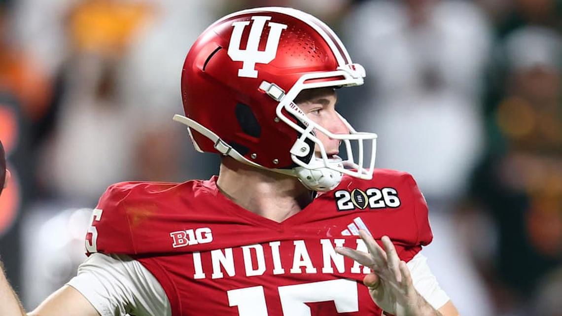  Jan 19, 2026; Miami Gardens, FL, USA; Indiana Hoosiers quarterback Fernando Mendoza (15) drops back to pass against the Miami Hurricanes in the first half during the College Football Playoff National Championship game at Hard Rock Stadium. Mandatory Credit: Mark J. Rebilas-Imagn Images | Mark J. Rebilas-Imagn Images 