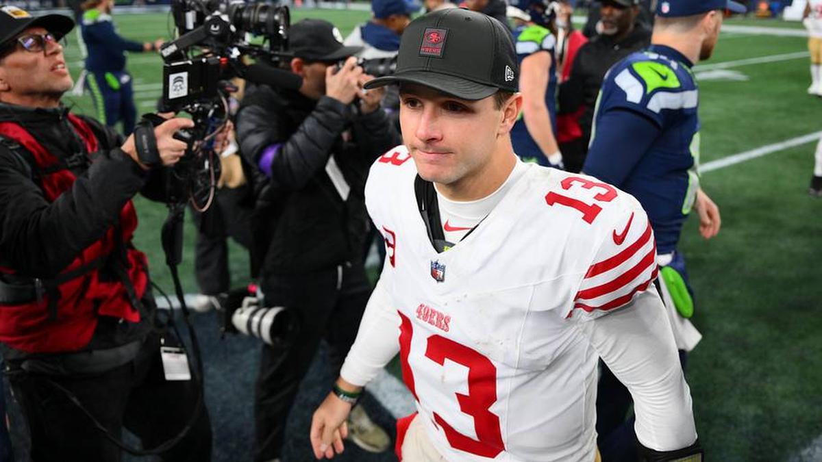  Jan 17, 2026; Seattle, WA, USA; San Francisco 49ers quarterback Brock Purdy (13) leaves the field following an NFC Divisional Round game against the Seattle Seahawks at Lumen Field. Mandatory Credit: Steven Bisig-Imagn Images | Steven Bisig-Imagn Images 