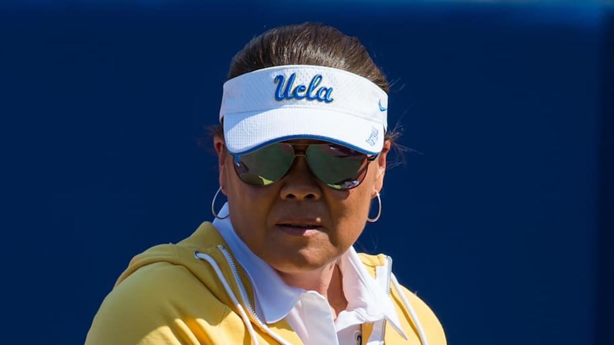  Jun 5, 2022; Oklahoma City, Oklahoma, USA; UCLA Bruins head coach Kelly Inouye-Perez heads back to the dugout during the sixth inning of the NCAA Women's College World Series game against the Florida Gators at USA Softball Hall of Fame Stadium. UCLA won 8-0. Mandatory Credit: Brett Rojo-Imagn Images | Brett Rojo-Imagn Images 