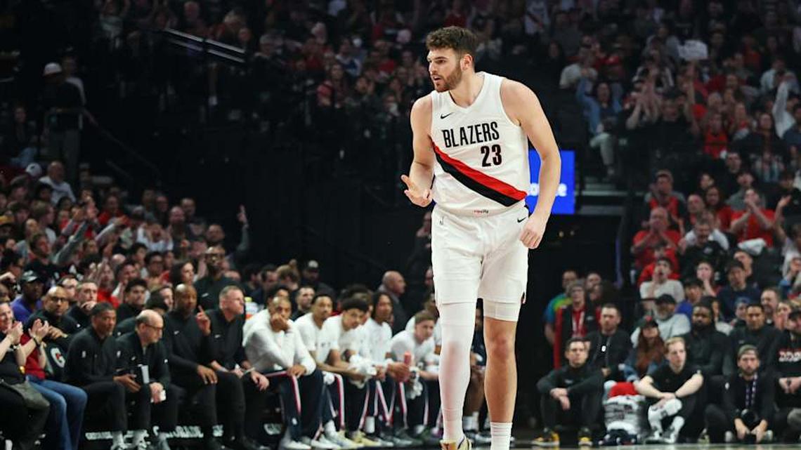  Apr 10, 2026; Portland, Oregon, USA; Portland Trail Blazers center Donovan Clingan (23) reacts after scoring against the LA Clippers during the first half at Moda Center. | Jaime Valdez-Imagn Images 