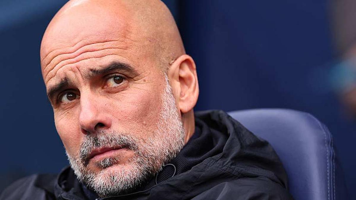  Pep Guardiola is seeking another Premier League trophy. | Robbie Jay Barratt - AMA/Getty Images 