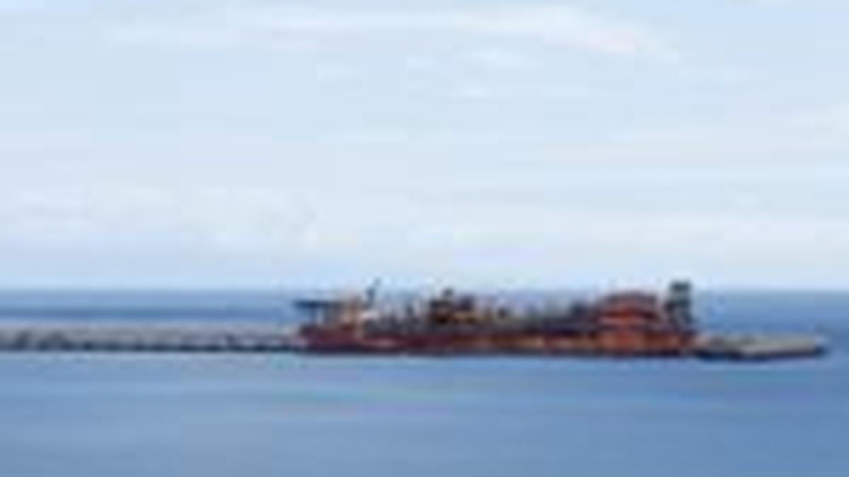 Ships at dock at Granadilla port, where the MV Hondius, carrying nearly 150 people, is expected to arrive within three days, Spain's Health Minister Monica Garcia said, adding that those on board were not presenting any symptoms of the disease, in Granadilla de Abona, Spain May 7, 2026. REUTERS/Borja Suarez