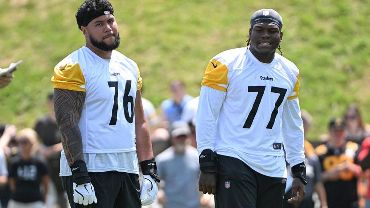  Jul 25, 2025; Pittsburgh, PA, USA; Pittsburgh Steelers offensive tackle Troy Fautanu (76) and offensive tackle Broderick Jones (77) participate in drills during training camp at Saint Vincent College. Mandatory Credit: Barry Reeger-Imagn Images | Barry Reeger-Imagn Images 