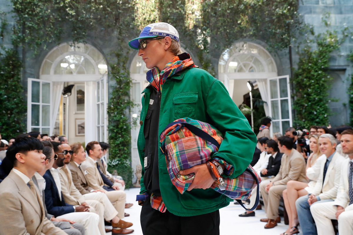 A model wears a creation during Ralph Lauren's presentation of its Spring/Summer 2027 men's collection in Milan, Italy, June 19, 2026 REUTERS/Alessandro Garofalo