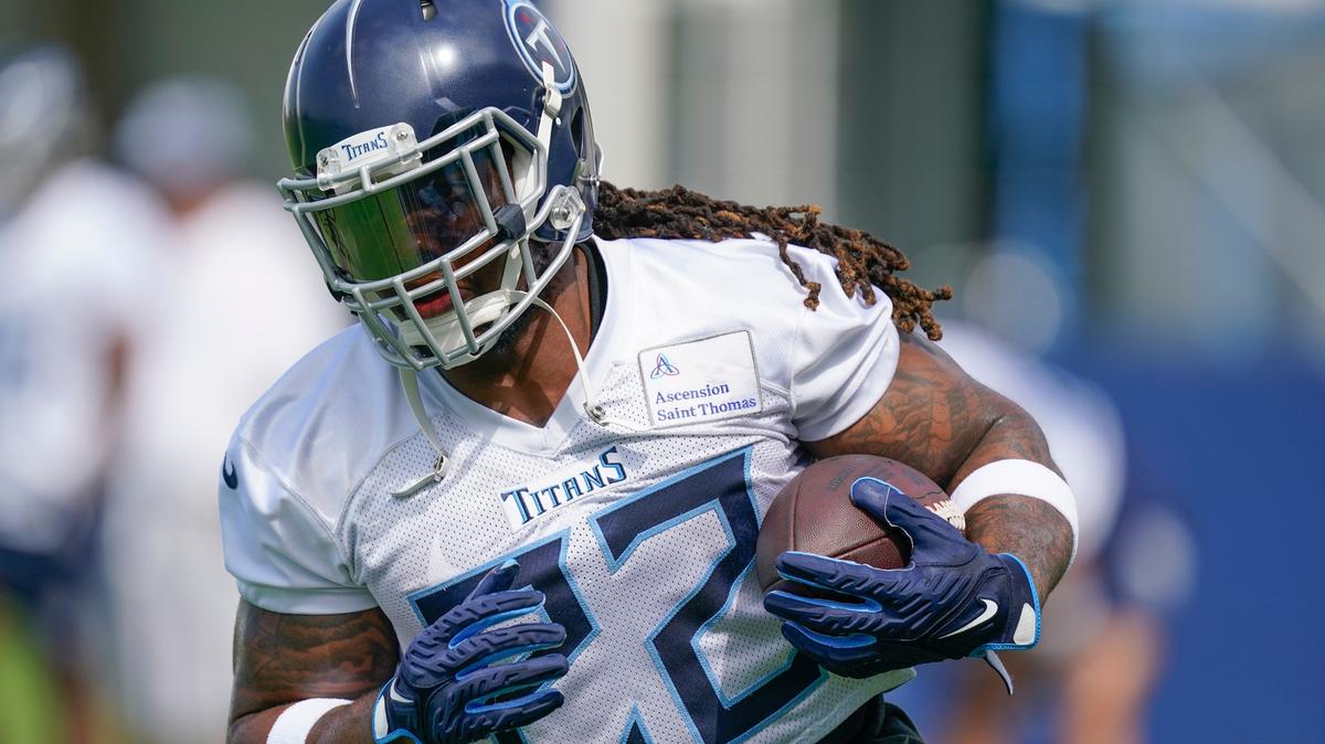 Tennessee Titans running back Derrick Henry takes part in a drill at the NFL football team’s practice facility Tuesday, June 14, 2022, in Nashville, Tenn. (AP Photo/Mark Humphrey)