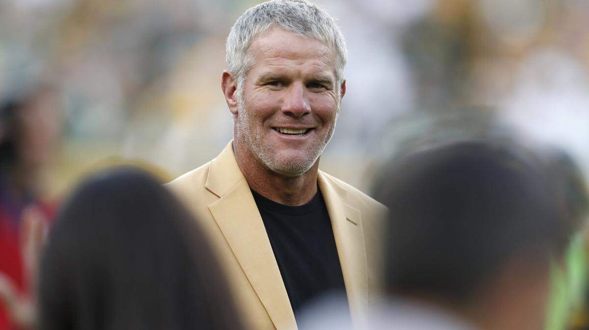 FILE - In this Oct. 16, 2016, file photo, Hall of Fame quarterback Brett Favre is shown during a halftime ceremony of an NFL football game against the Dallas Cowboys, in Green Bay, Wis.