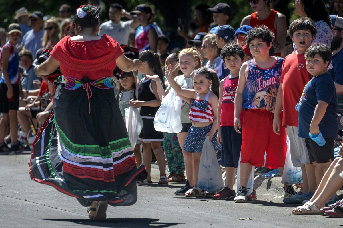  Residents watch an Independence Day parade in Storm Lake, Iowa, where about 40% of the population claims Hispanic heritage. Scott Olson/Getty Images 