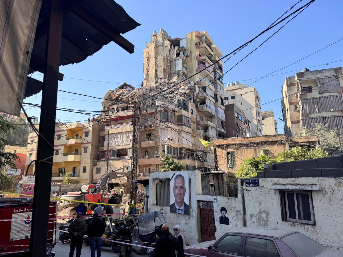 Rescuers work at the site of an Israeli strike that took place yesterday, in the southern suburbs of Beirut, Lebanon, May 7, 2026. Picture taken with a mobile phone. REUTERS/Mohamad Azakir