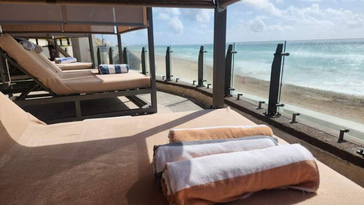 The beach-facing pool cabanas are a lovely way to relax and enjoy the ocean views with the family while still sitting just steps from the pool. Photo credit: Kimberly Miles 