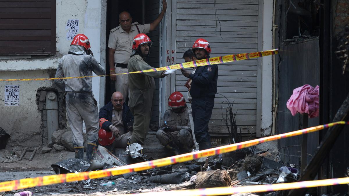 Firefighters work at the site after a fire at a hotel in New Delhi, India, June 3, 2026. REUTERS/Adnan Abidi