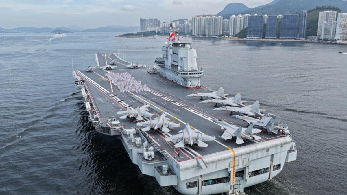 A fleet of the Chinese People's Liberation Army (PLA) Navy led by the aircraft carrier Shandong arrived in the Hong Kong Special Administrative Region (HKSAR) . Photo by LIU FANG / XINHUA / EPA