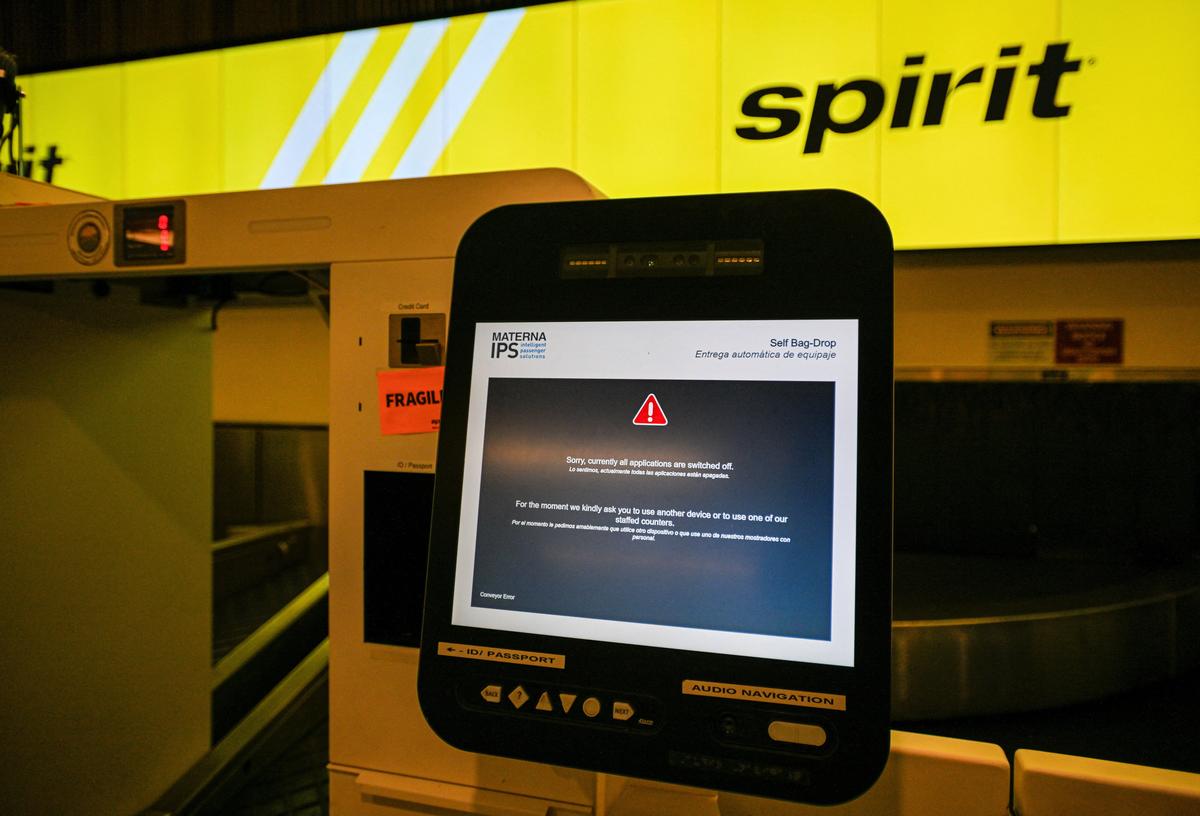A self bag-drop kiosk at Orlando International Airport displays an "all applications are switched off" message, as Spirit Airlines announced it was ceasing operations early Saturday morning following an impasse in talks with some creditors on a $500 million government bailout plan, in Orlando, Florida, U.S., May 2, 2026. REUTERS/Miguel Rodriguez