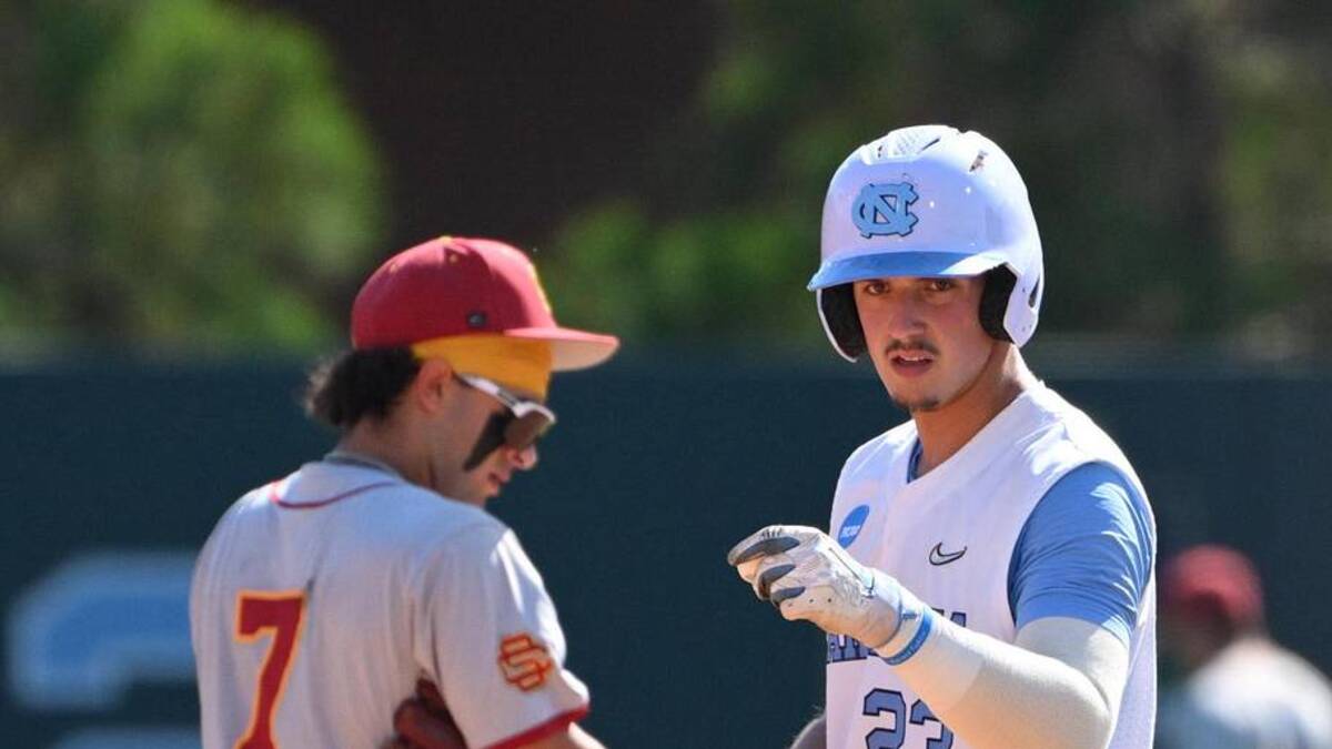  Jun 5, 2026; Chapel Hill, NC, USA; North Carolina Tar Heels catcher Colin Hynek (23) reacts after making it to second base against the USC Trojans in the fourth inning at Boshamer Stadium. Mandatory Credit: Zachary Taft-Imagn Images | Zachary Taft-Imagn Images 