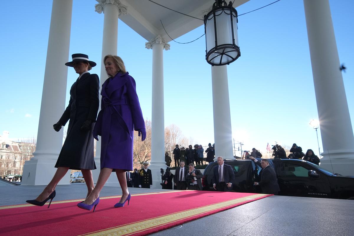  First ladies Melania Trump (L) and Jill Biden walk into the U.S. Capitol ahead of Donald Trump’s inauguration on January 20, 2025. 