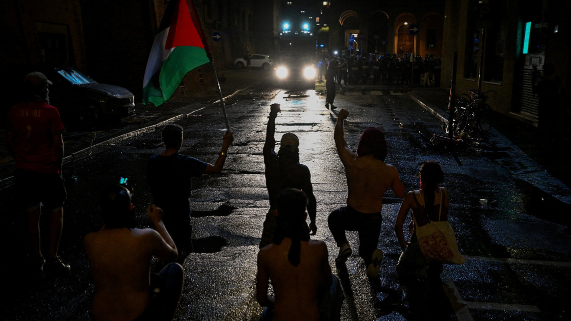Police clash with protesters in Bologna after man dies during arrest attempt 