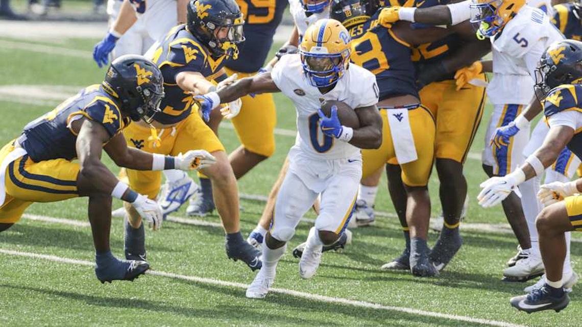  Sep 13, 2025; Morgantown, West Virginia, USA; Pittsburgh Panthers running back Desmond Reid (0) runs the ball during the first quarter against the West Virginia Mountaineers at Milan Puskar Stadium. Mandatory Credit: Ben Queen-Imagn Images | Ben Queen-Imagn Images 