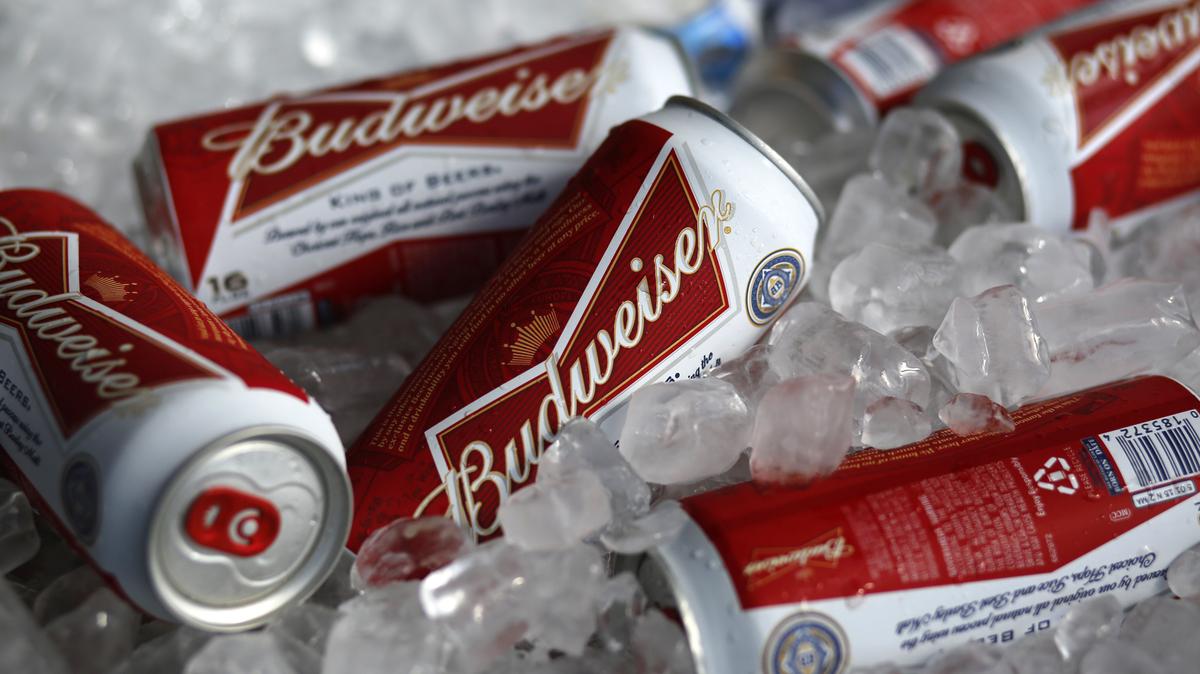 FILE - In this Thursday, March 5, 2015, file photo, Budweiser beer cans are seen at a concession stand at McKechnie Field in Bradenton, Fla. World Cup organizers reportedly have made another late change in alcohol policy only two days before games start in Qatar by banning beer sales at the eight soccer stadiums in and around Doha. Media reports say Qatari authorities are pressing FIFA to ban all sales of long-time World Cup beer sponsor Budweiser at the eight venues. (AP Photo/Gene J. Puskar, File)