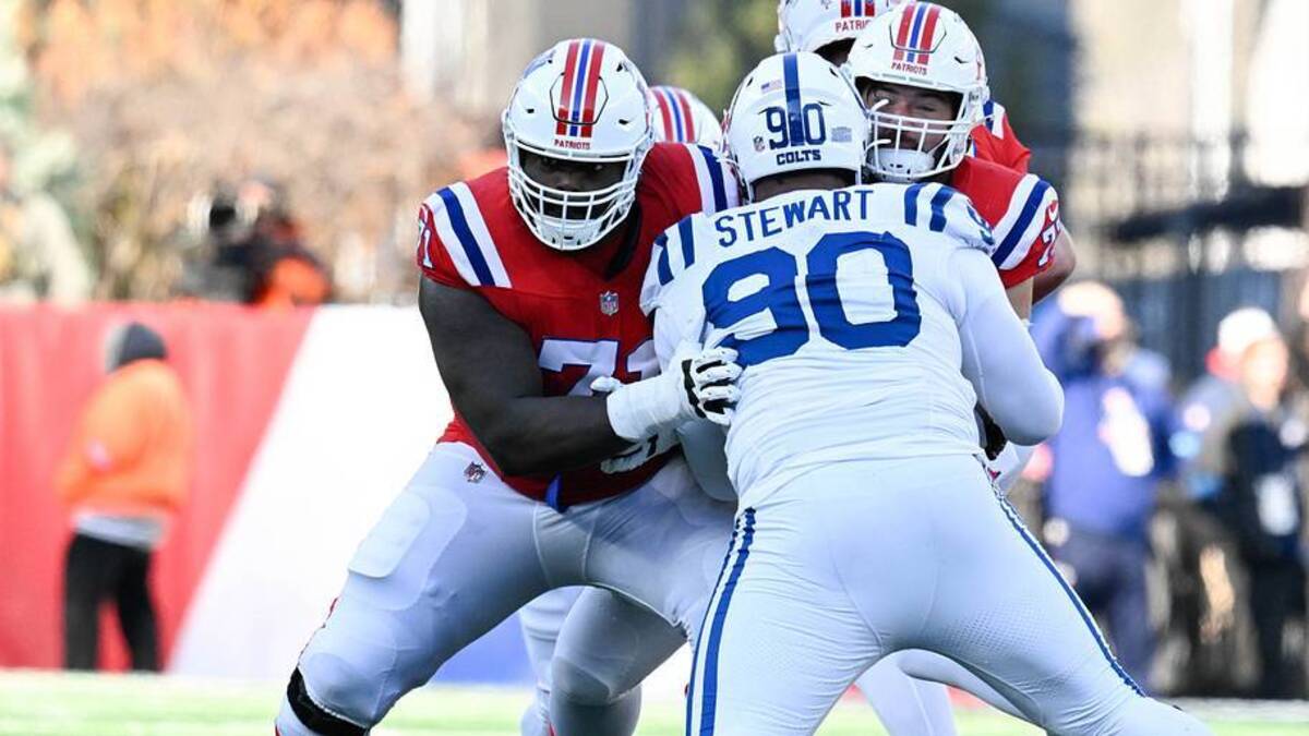  Dec 1, 2024; Foxborough, Massachusetts, USA; New England Patriots offensive tackle Mike Onwenu (71) blocks Indianapolis Colts defensive tackle Grover Stewart (90) during the first half at Gillette Stadium. Mandatory Credit: Eric Canha-Imagn Images | USA TODAY Sports via Reuters Connect 