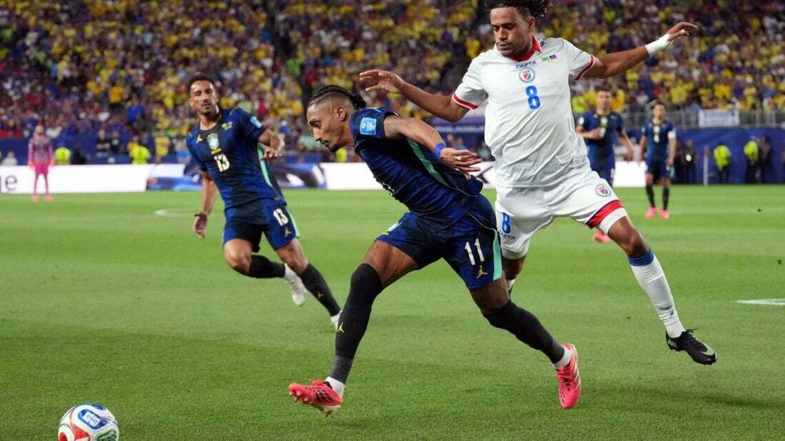Brazil's Raphinha (leg) departs match vs. Haiti