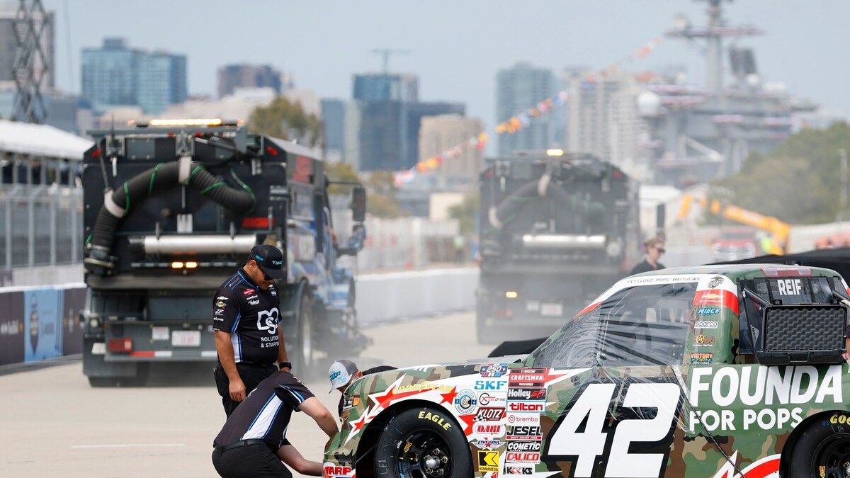 The NASCAR Craftsman Truck Series No. 42 Chevrolet which is driven by Tyler Reif is wrapped for the night as street sweepers clean the pits in preparation for NASCAR San Diego races on June 18, 2026 in Coronado, CA. (K.C. Alfred / The San Diego Union-Tribune)