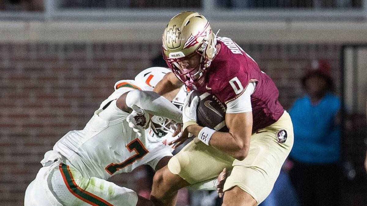  Florida State Seminoles wide receiver Duce Robinson (0) fights off a defender as he runs the ball down the field. The Miami Hurricanes defeated the Florida State Seminoles 22-28 at Doak Campbell Stadium on Saturday, Oct. 4, 2025. | USA TODAY Network via Reuters Connect 